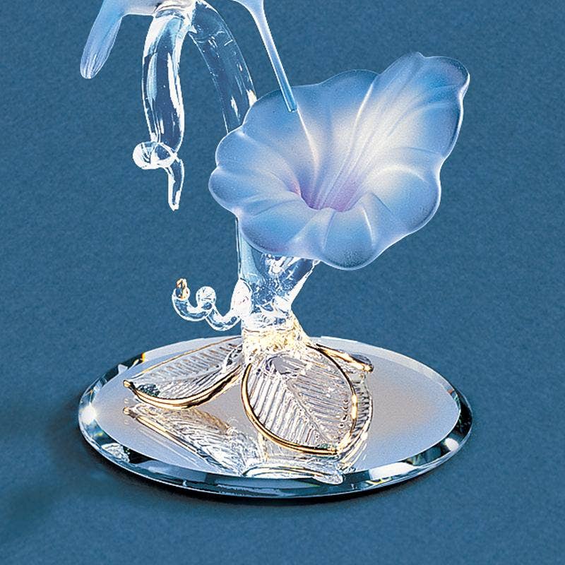 Blue Hummingbird Perched on Lily