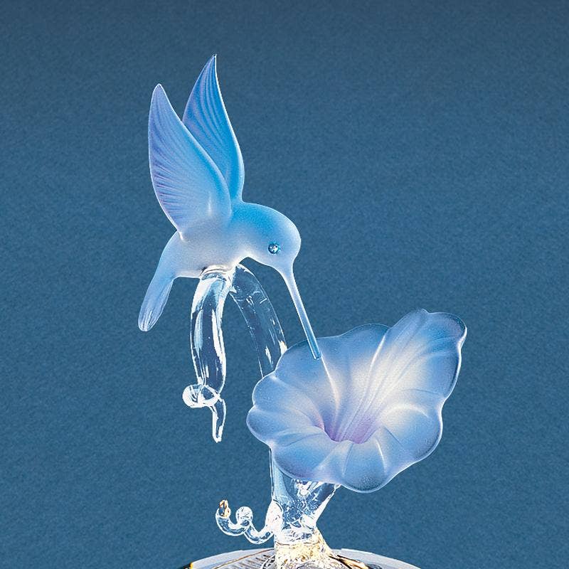 Blue Hummingbird Perched on Lily